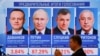 Una pantalla muestra los resultados preliminares de las elecciones presidenciales de Rusia, en la Comisión Electoral Central en Moscú, Rusia, el 18 de marzo de 2024. REUTERS/Evgenia Novozhenina