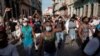 Manifestantes gritan consignas antigubernamentales durante la protesta del 11 de julio en La Habana. (REUTERS/Alexandre Meneghini)