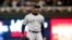 El cubano Aroldis Chapman, relevista de los Yanquis de Nueva York, festeja tras la barrida sobre los Mellizos de Minnesota en la Serie Divisional de la Liga Americana, el 7 de octubre de 2019 (AP Foto/Jim Mone)